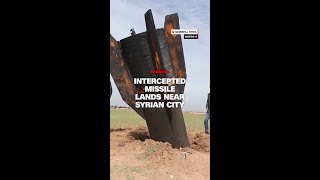 Intercepted missile lands near Syrian city